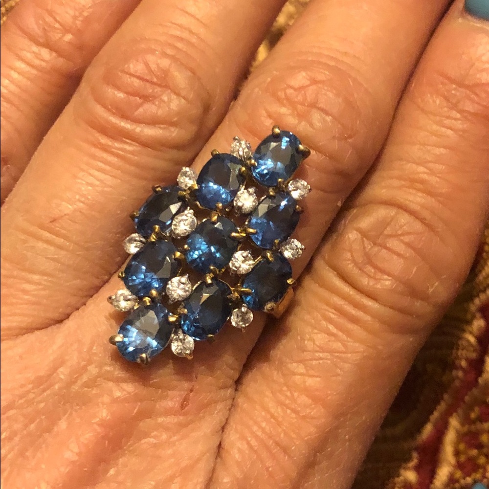18 karat gold rhodium on top of silver. Size 6-6.5